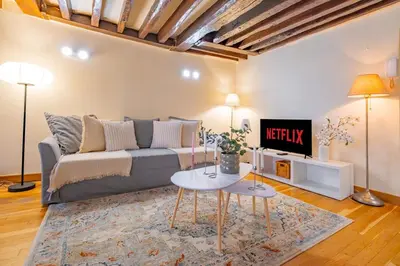 Coin salon dans l'établissement Apt Grands Boulevards 4 Guests