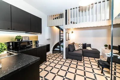 Cuisine ou kitchenette dans l'établissement Triplex 50 m2 - Montorgueil & Marais