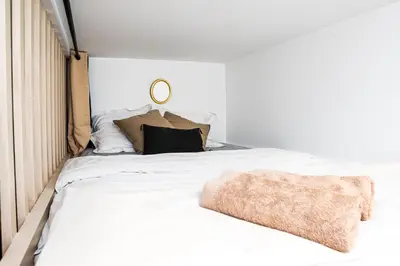 Un ou plusieurs lits dans un hébergement de l'établissement Triplex 50 m2 - Montorgueil & Marais