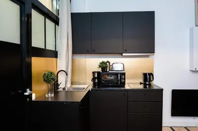 Cuisine ou kitchenette dans l'établissement Triplex 50 m2 - Montorgueil & Marais