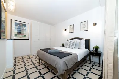 Un ou plusieurs lits dans un hébergement de l'établissement Triplex 50 m2 - Montorgueil & Marais