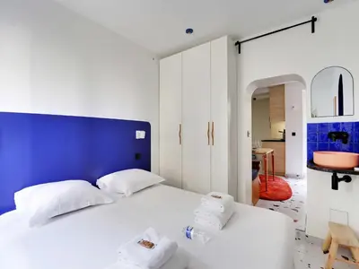 Un ou plusieurs lits dans un hébergement de l'établissement Authentic apartment - 1BR 2P - Goutte-d'Or