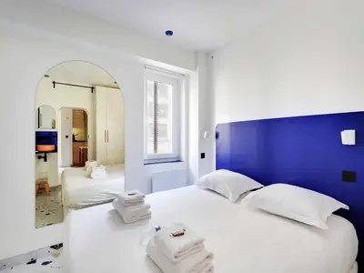 Un ou plusieurs lits dans un hébergement de l'établissement Authentic apartment - 1BR 2P - Goutte-d'Or