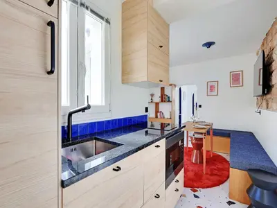 Cuisine ou kitchenette dans l'établissement Authentic apartment - 1BR 2P - Goutte-d'Or