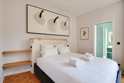Un ou plusieurs lits dans un hébergement de l'établissement Pick A Flat's apartment in Monmartre - Rue Etex