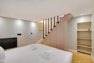 Un ou plusieurs lits dans un hébergement de l'établissement Pick A Flat's apartment in Monmartre - Rue Etex