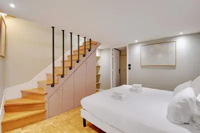 Un ou plusieurs lits dans un hébergement de l'établissement Pick A Flat's apartment in Monmartre - Rue Etex