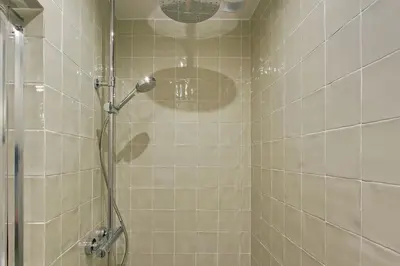 Salle de bains dans l'établissement 2 appartements en 1 - Superbe logement près du Louvre l 12P
