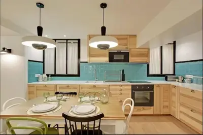 Cuisine ou kitchenette dans l'établissement Superbe appartement aux Halles I