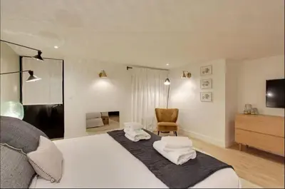 Un ou plusieurs lits dans un hébergement de l'établissement Sublime apartment - Halles II