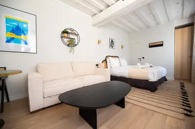 Un ou plusieurs lits dans un hébergement de l'établissement Cosy Studio with Prime Location, Le Marais