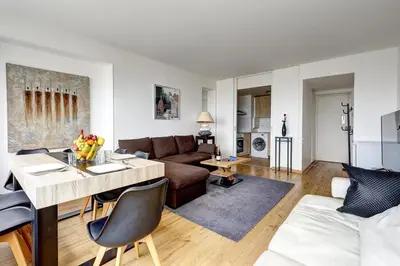 Coin salon dans l'établissement 5019 Suite Pouey - Apartment near La Défense