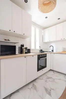 Cuisine ou kitchenette dans l'établissement Cosy 1BR, Newly Renovated - Clichy | By Airnest