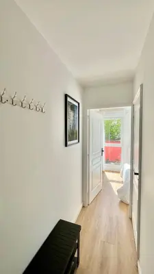 Télévision ou salle de divertissement dans l'établissement Maison 88 Malakoff