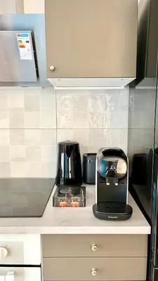 Cuisine ou kitchenette dans l'établissement Maison 88 Malakoff