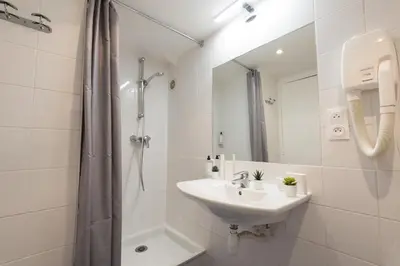 Salle de bains dans l'établissement Hotel Beauvoir