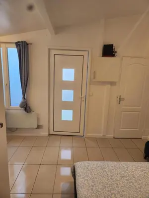 Un ou plusieurs lits dans un hébergement de l'établissement Maison studio