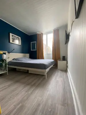 Un ou plusieurs lits dans un hébergement de l'établissement Beautiful Studio