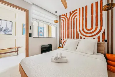 Un ou plusieurs lits dans un hébergement de l'établissement Appartement central 2BDR - 6P le Marais