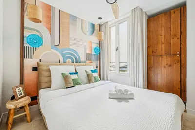 Un ou plusieurs lits dans un hébergement de l'établissement Appartement central 2BDR - 6P le Marais