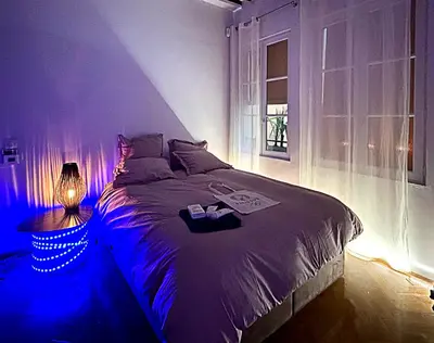 Un ou plusieurs lits dans un hébergement de l'établissement Superbe et inoubliable Appart Le Marais Paris