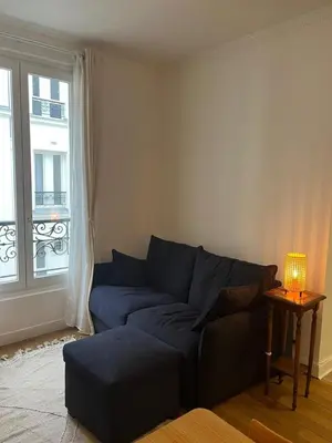 Coin salon dans l'établissement Modern & Bright Apartment near Batignolles
