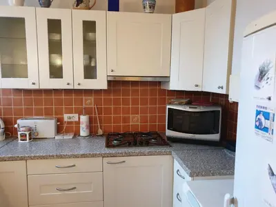 Cuisine ou kitchenette dans l'établissement Dagorno - CI - Paris 12eme - Appartement pour 4 personnes