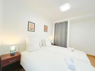 Un ou plusieurs lits dans un hébergement de l'établissement Apartment Le Marais