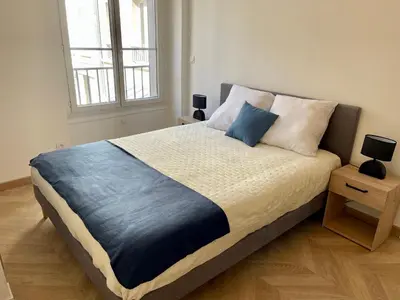 Un ou plusieurs lits dans un hébergement de l'établissement Appartement Convention Maridor 3