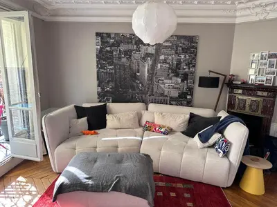 Coin salon dans l'établissement Appartement muette