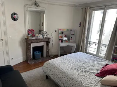 Un ou plusieurs lits dans un hébergement de l'établissement Appartement muette