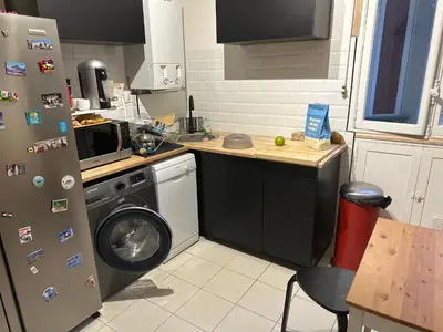 Cuisine ou kitchenette dans l'établissement Appartement muette