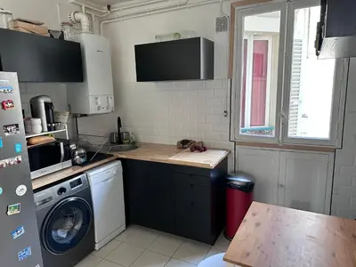 Cuisine ou kitchenette dans l'établissement Appartement muette