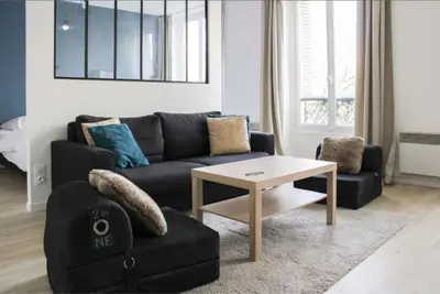 Coin salon dans l'établissement Superb apartment 1BR 4P - Etoiles Ternes