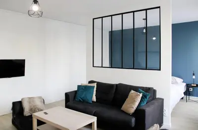 Coin salon dans l'établissement Superb apartment 1BR 4P - Etoiles Ternes