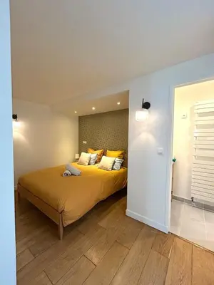Un ou plusieurs lits dans un hébergement de l'établissement Outstanding and sunbathed 3 br