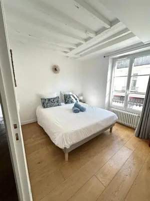 Un ou plusieurs lits dans un hébergement de l'établissement Outstanding and sunbathed 3 br