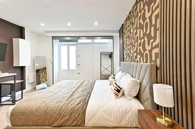 Un ou plusieurs lits dans un hébergement de l'établissement Studio Élégant Paris - Père Lachaise