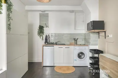 Cuisine ou kitchenette dans l'établissement Flexliving - Onebedroom - Mademoiselle