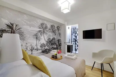 Un ou plusieurs lits dans un hébergement de l'établissement Chic apartment - 2BR 6P - Saint-Ambroise