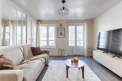Télévision ou salle de divertissement dans l'établissement Appartement de Charme rue Lafayette 4P-1BR