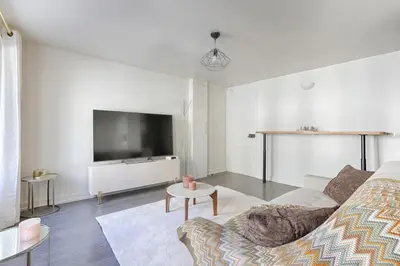 Télévision ou salle de divertissement dans l'établissement Appartement de Charme rue Lafayette 4P-1BR