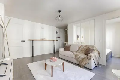 Coin salon dans l'établissement Appartement de Charme rue Lafayette 4P-1BR