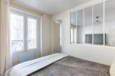 Un ou plusieurs lits dans un hébergement de l'établissement Appartement de Charme rue Lafayette 4P-1BR