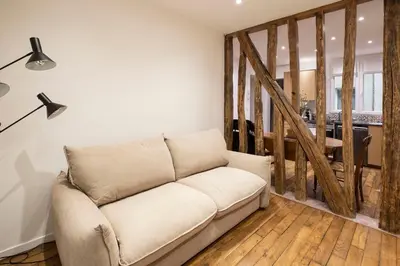 Coin salon dans l'établissement Nid cosy pour 2 pers -Canal St Martin -Paris 10*