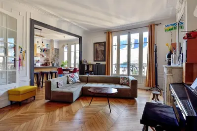 Coin salon dans l'établissement Appartement Poliveau - Welkeys