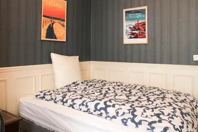 Un ou plusieurs lits dans un hébergement de l'établissement Lovely Paris flat close to Eiffel Tower