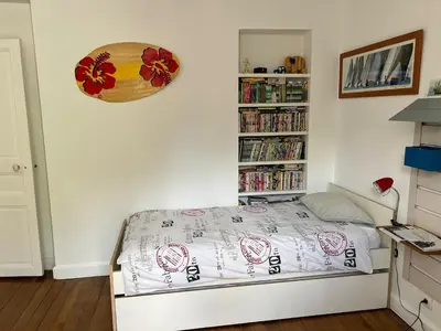 Un ou plusieurs lits dans un hébergement de l'établissement Hotel particulier Montrouge -limitrophe Paris