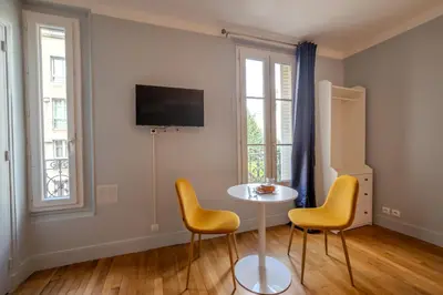 Télévision ou salle de divertissement dans l'établissement Majestic Suite