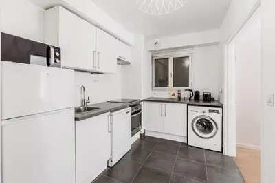 Cuisine ou kitchenette dans l'établissement Beautiful 4P Apartment with Garden - Paris 16th